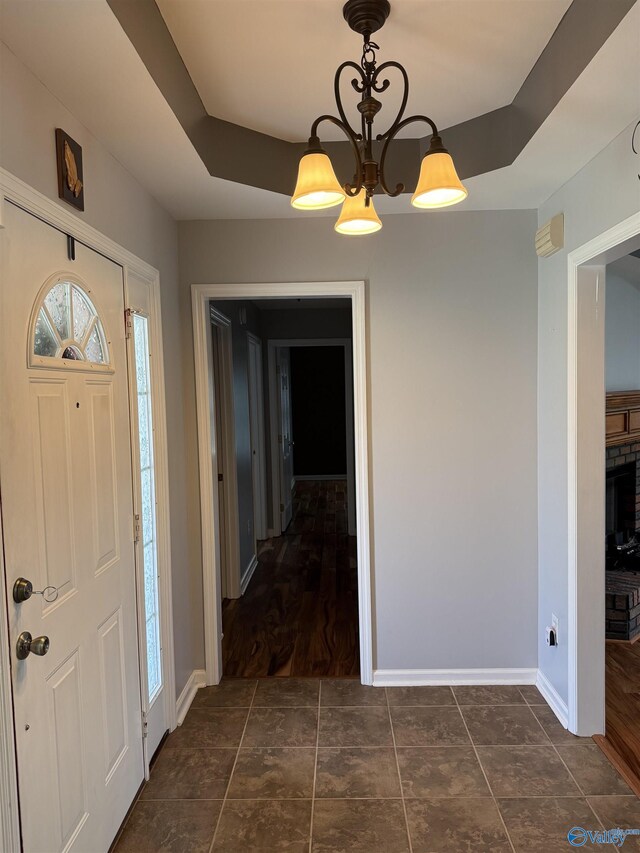103 Katelyn Dr, Meridianville, AL 35759 - foyer entrance with baseboards and dark tile patterned flooring