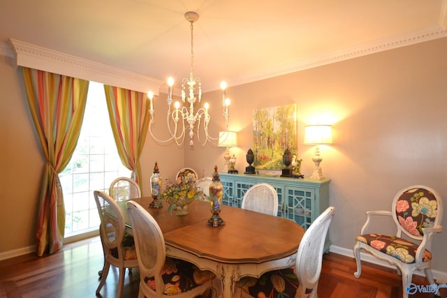 dining area with a chandelier and hardwood / wood-style flooring