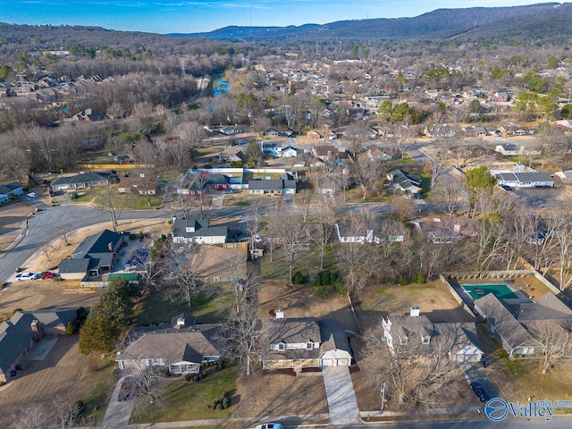 drone / aerial view with a residential view and a mountain view