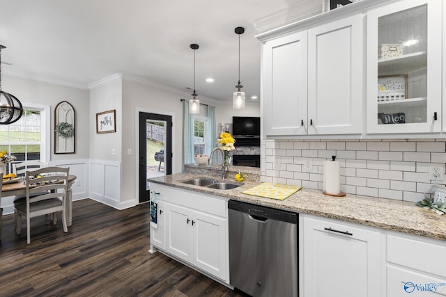 kitchen featuring white cabinetry, dark hardwood / wood-style flooring, stainless steel dishwasher, and sink