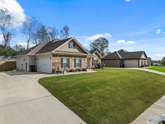 view of front facade with a garage and a front yard