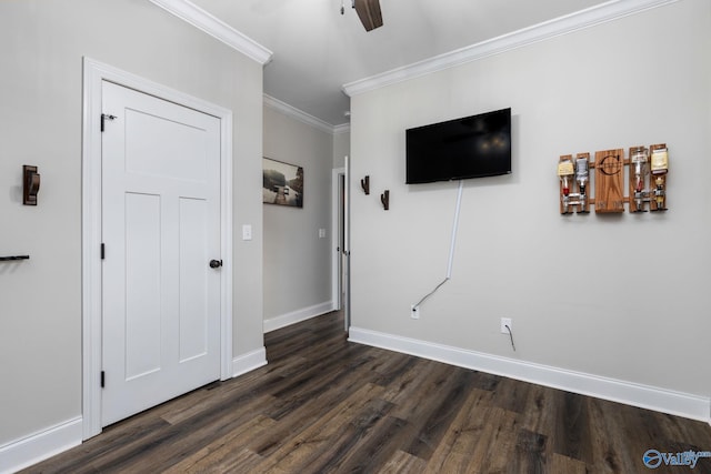 bedroom with dark wood-type flooring, ceiling fan, and crown molding