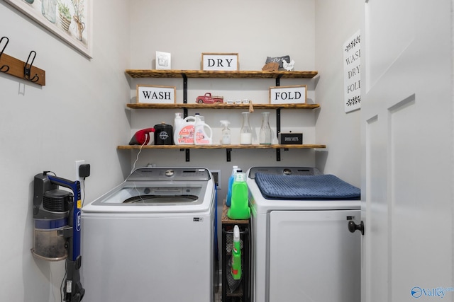 washroom featuring washing machine and dryer