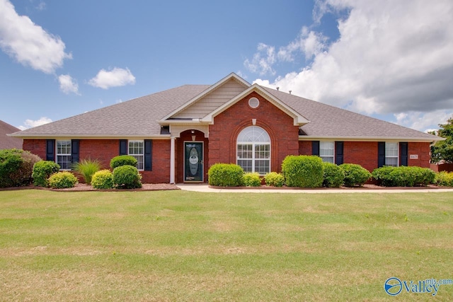 16675 Bellewood Dr, Athens, AL 35613 - single story home with brick siding, a front lawn, and roof with shingles