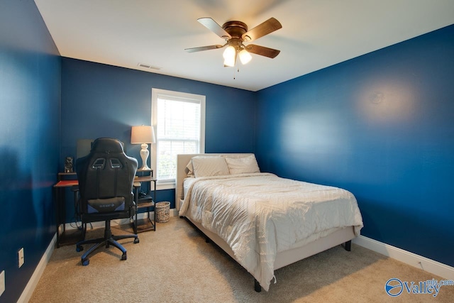 16675 Bellewood Dr, Athens, AL 35613 - carpeted bedroom featuring baseboards and a ceiling fan