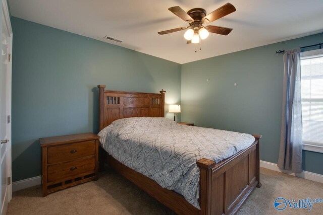 16675 Bellewood Dr, Athens, AL 35613 - bedroom featuring light colored carpet, baseboards, and a ceiling fan