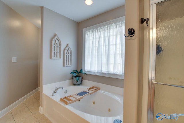 16675 Bellewood Dr, Athens, AL 35613 - full bath featuring tile patterned flooring, a whirlpool tub, a shower with shower door, and baseboards