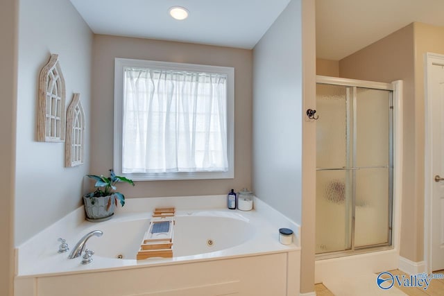 16675 Bellewood Dr, Athens, AL 35613 - bathroom with a shower stall, a tub with jets, and recessed lighting