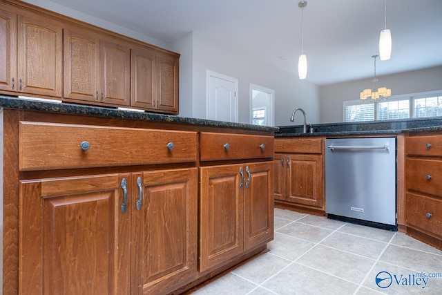 kitchen featuring sink, light tile patterned flooring, dishwasher, decorative light fixtures, and an inviting chandelier