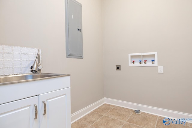 laundry area with hookup for a washing machine, sink, electric panel, electric dryer hookup, and cabinets