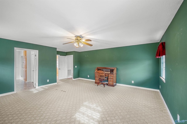 unfurnished bedroom featuring carpet floors and ceiling fan