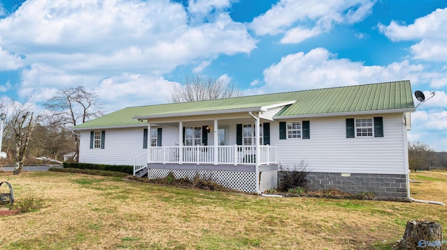 ranch-style house with a front lawn and a porch