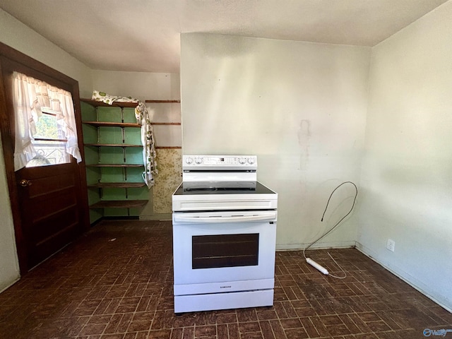 312 8th Ave SW, Attalla, AL 35954 - kitchen featuring white electric stove, brick patterned flooring, and baseboards