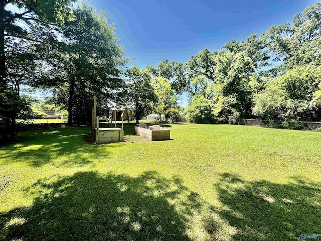 312 8th Ave SW, Attalla, AL 35954 - view of yard with a vegetable garden