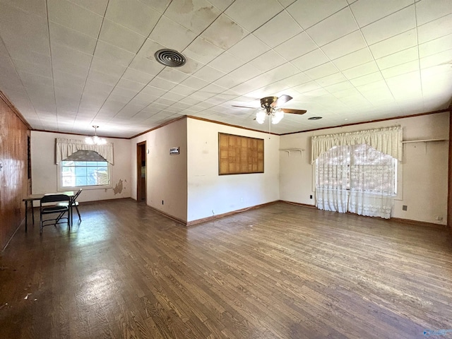 312 8th Ave SW, Attalla, AL 35954 - unfurnished living room featuring crown molding, wood finished floors, ceiling fan, baseboards, and a chandelier