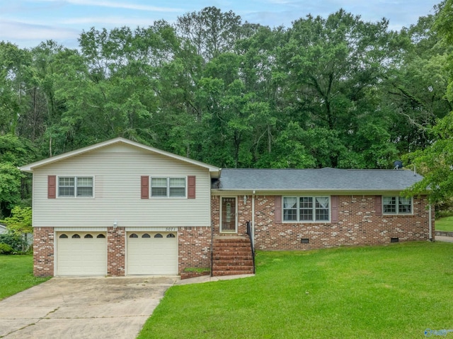split level home featuring concrete driveway, brick siding, an attached garage, and a front lawn