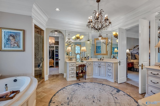 bathroom featuring vanity, separate shower and tub, and ornamental molding