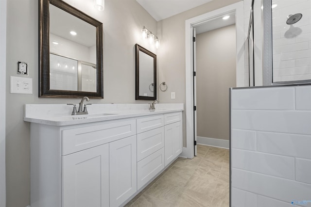 bathroom with vanity and an enclosed shower