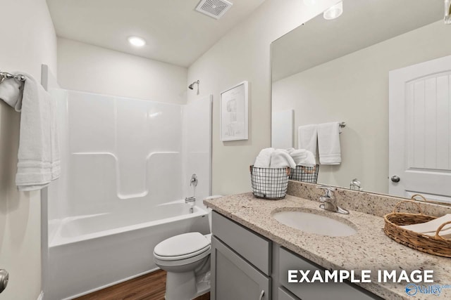152 Rose Valley Dr, New Market, AL 35761 - bathroom with visible vents, toilet, wood finished floors, washtub / shower combination, and vanity
