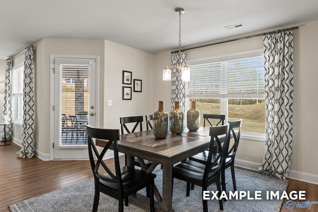 152 Rose Valley Dr, New Market, AL 35761 - dining room with visible vents, a healthy amount of sunlight, and wood finished floors