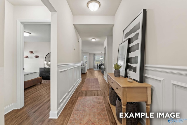 152 Rose Valley Dr, New Market, AL 35761 - corridor featuring a decorative wall, a wainscoted wall, and wood finished floors