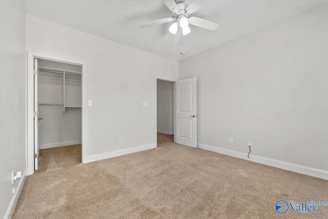 unfurnished bedroom with light carpet, a closet, and ceiling fan