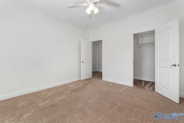 unfurnished bedroom featuring carpet flooring, a closet, and ceiling fan