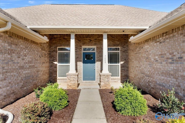 doorway to property featuring a porch