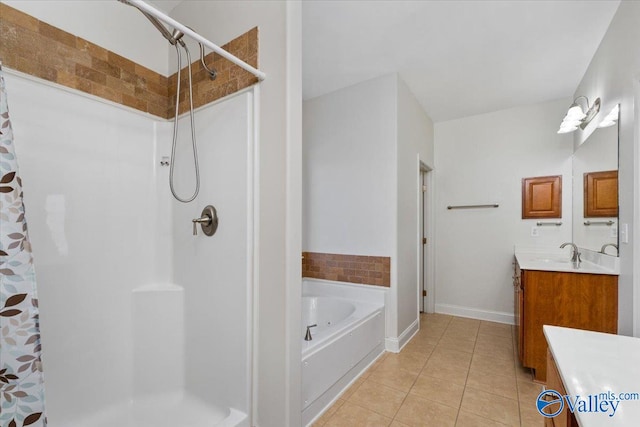 bathroom with vanity, independent shower and bath, and tile patterned floors