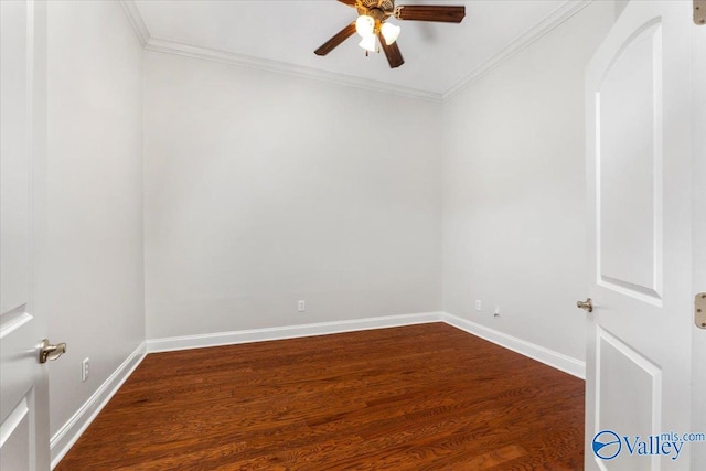 empty room with ornamental molding, hardwood / wood-style floors, and ceiling fan