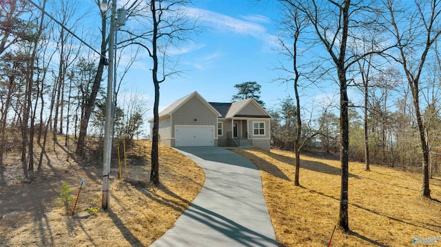 view of front facade featuring a garage and concrete driveway