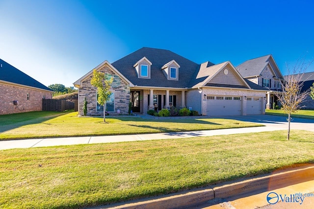 craftsman inspired home with a front lawn