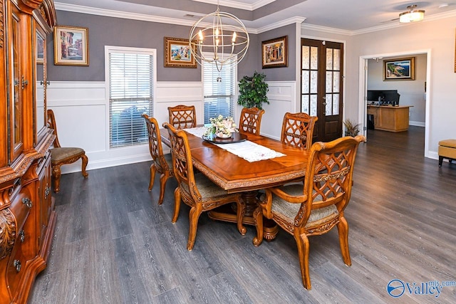 dining room with dark wood-type flooring, french doors, and a wealth of natural light