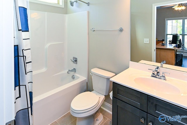 full bathroom with vanity, toilet, shower / bath combo, and tile patterned flooring