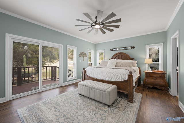 bedroom with baseboards, wood finished floors, crown molding, and access to outside