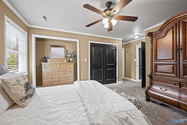 bedroom with visible vents, ornamental molding, baseboards, and carpet floors