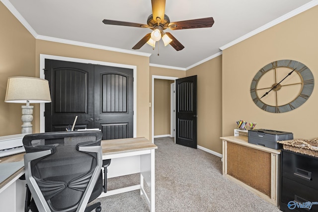 home office with baseboards, light carpet, ornamental molding, and a ceiling fan