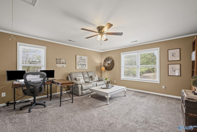 living room featuring visible vents, carpet flooring, crown molding, baseboards, and ceiling fan