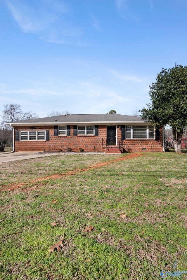 single story home with crawl space, brick siding, and a front yard