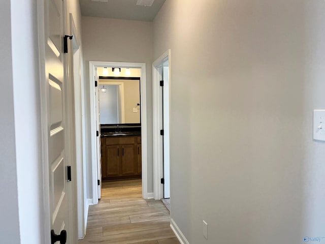 120 Parvin Way Dr, Hazel Green, AL 35750 - hallway with light wood-style floors and a sink