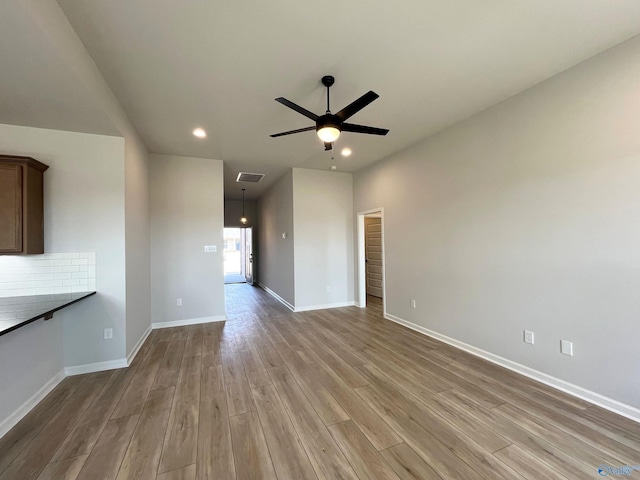 120 Parvin Way Dr, Hazel Green, AL 35750 - unfurnished living room with light wood-style flooring, recessed lighting, baseboards, visible vents, and a ceiling fan