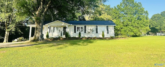 2010 Youngs Chapel Rd, Piedmont, AL 36272 - ranch-style house featuring a front lawn and metal roof