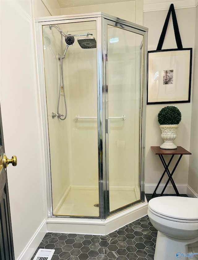 2010 Youngs Chapel Rd, Piedmont, AL 36272 - full bath with a shower stall, toilet, and baseboards