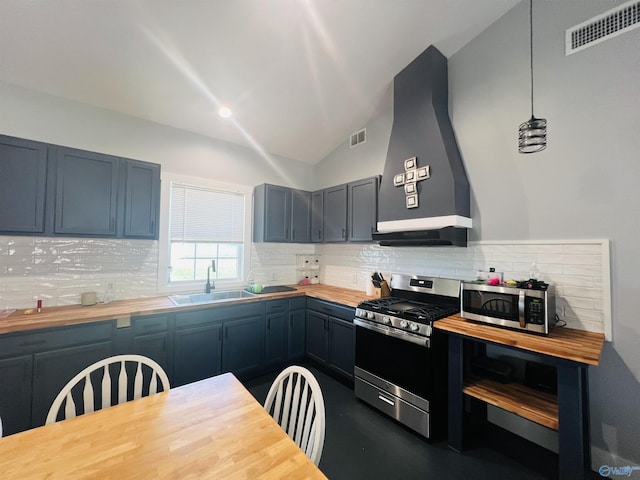 450 County Road 803, Centre, AL 35960 - kitchen featuring visible vents, a sink, stainless steel appliances, wall chimney exhaust hood, and butcher block counters