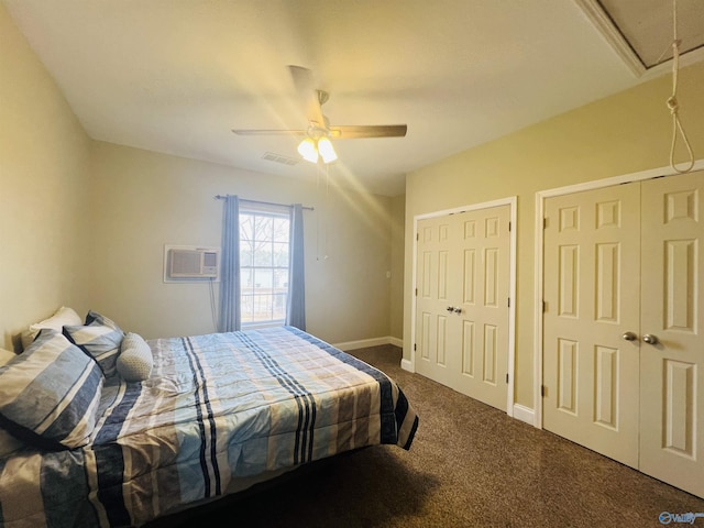 450 County Road 803, Centre, AL 35960 - carpeted bedroom featuring visible vents, baseboards, attic access, an AC wall unit, and multiple closets