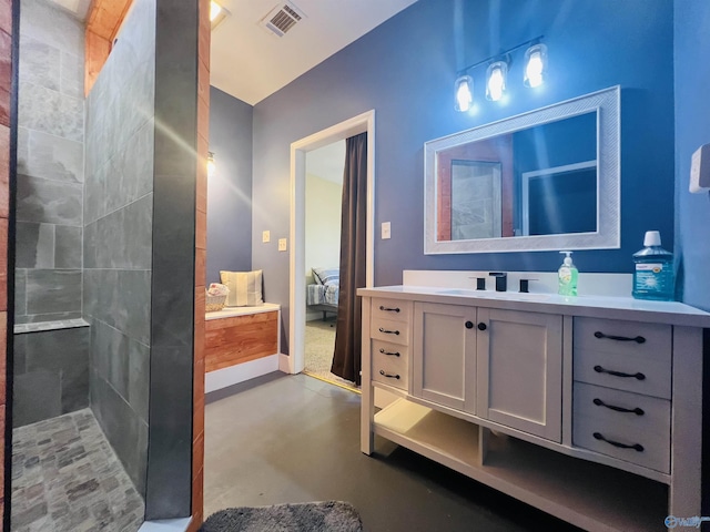 450 County Road 803, Centre, AL 35960 - full bathroom featuring visible vents, finished concrete floors, connected bathroom, walk in shower, and vanity