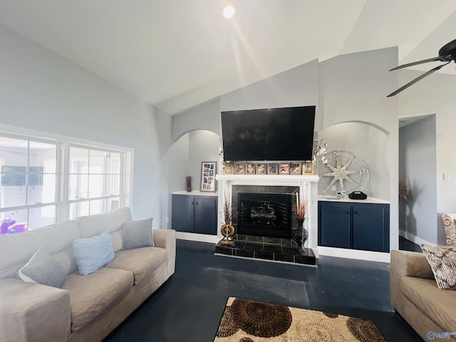 450 County Road 803, Centre, AL 35960 - living area featuring arched walkways, a fireplace, ceiling fan, and vaulted ceiling