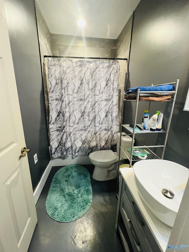450 County Road 803, Centre, AL 35960 - bathroom with concrete flooring, toilet, vanity, and shower / bath combo