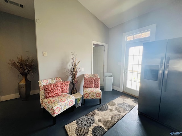 450 County Road 803, Centre, AL 35960 - sitting room featuring vaulted ceiling, baseboards, visible vents, and concrete floors