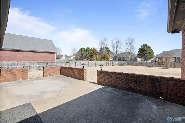 view of patio with a fenced backyard